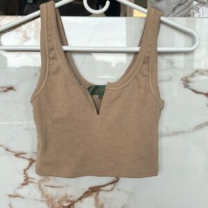 Tan cropped slit in front top